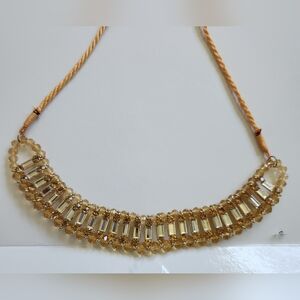 Champagne tassel necklace. Adjustable length